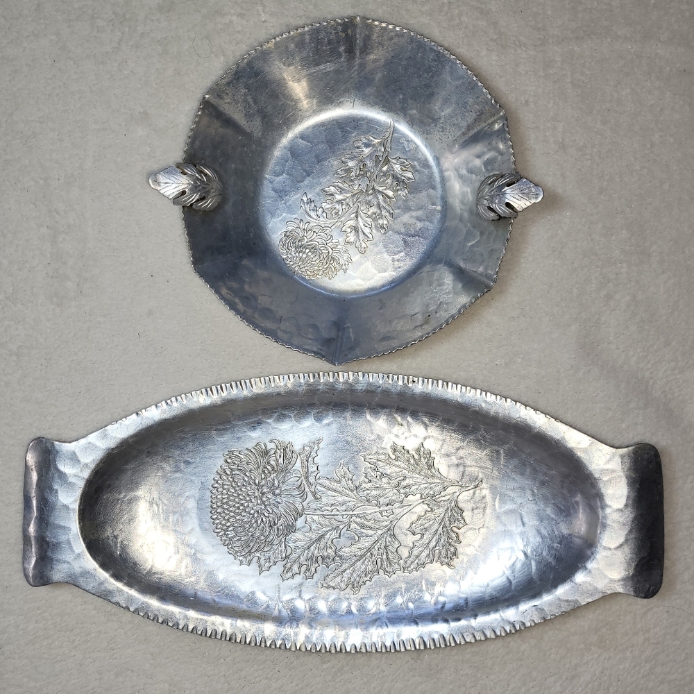 TRADE CONTINENTAL MARK, Set Of 2 Hand-Wrought Aluminum Pieces With Floral Design